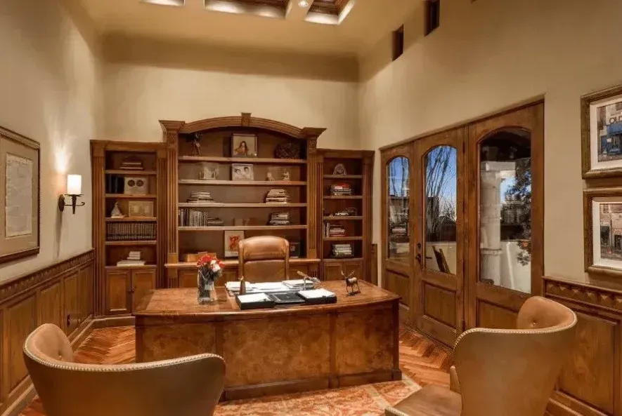 Modern home office with wood paneling and natural elements