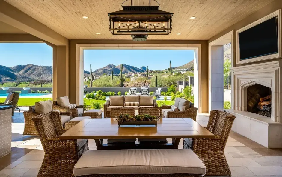 Outdoor entertainment space with pool, firepit and views