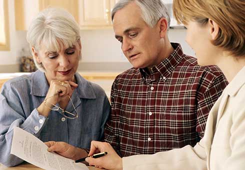Wills — Elderly Couple Discussing Contract in Kennett, MO Wills — Elderly Couple Discussing Contract in Kennett, MO