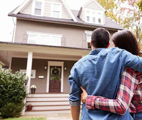 Real Estate Attorneys — Couple Looking At New House in Kennett, MO Real Estate Attorneys — Couple Looking At New House in Kennett, MO