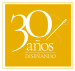 Un cartel amarillo que dice 30 años diseñando