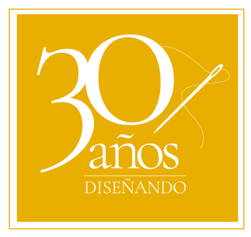 Un cartel amarillo que dice 30 años diseñando