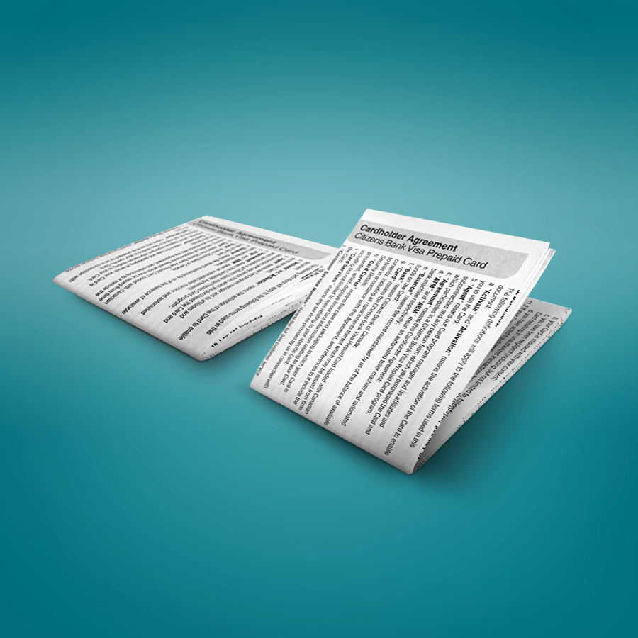 Two pieces of paper are sitting on top of each other on a blue surface.