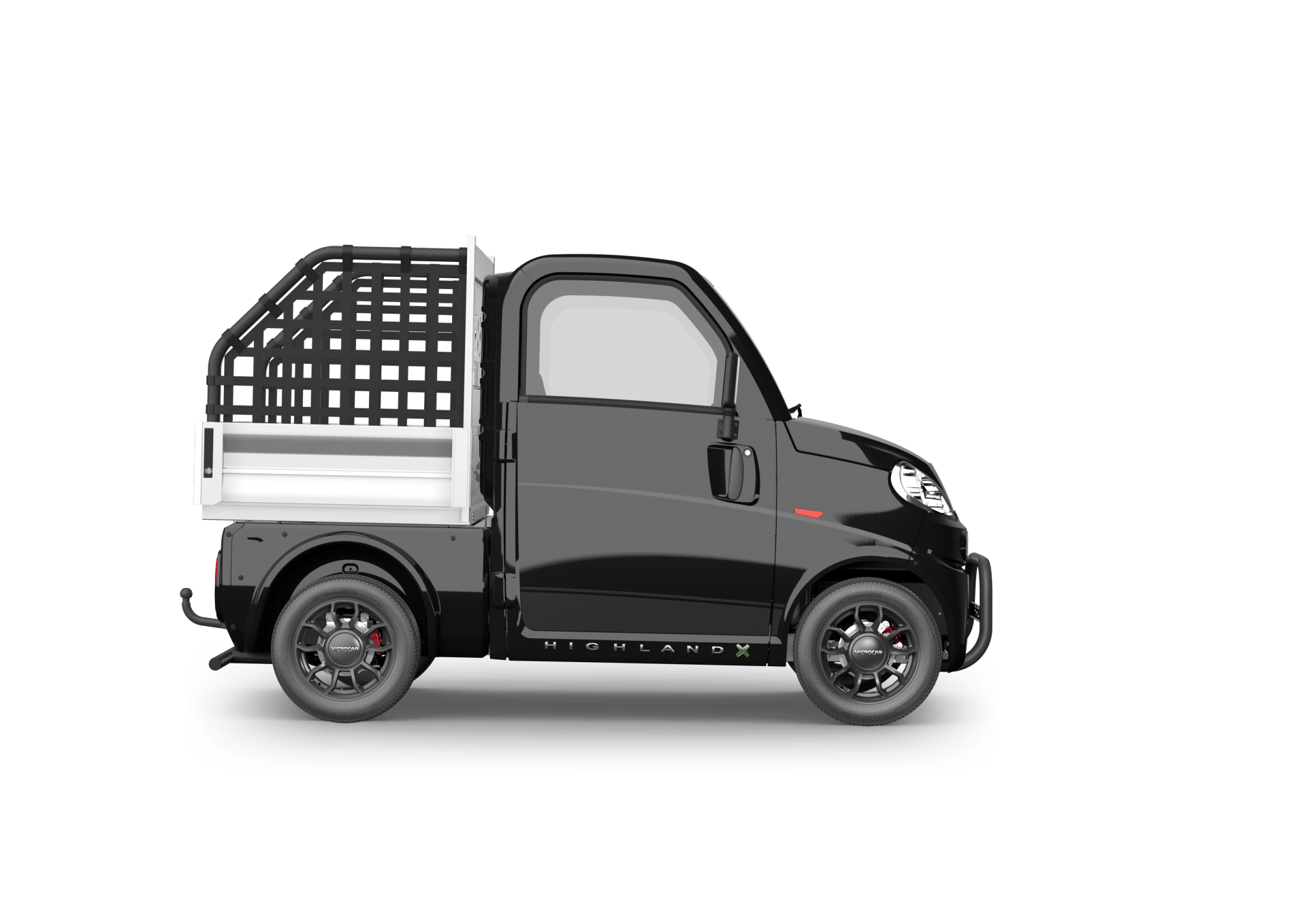 Un camion noir et blanc avec une cage à l'arrière.