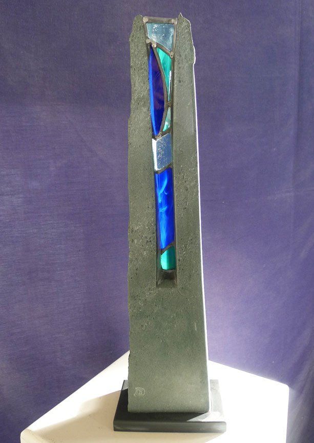 Stone with stained glass inset.