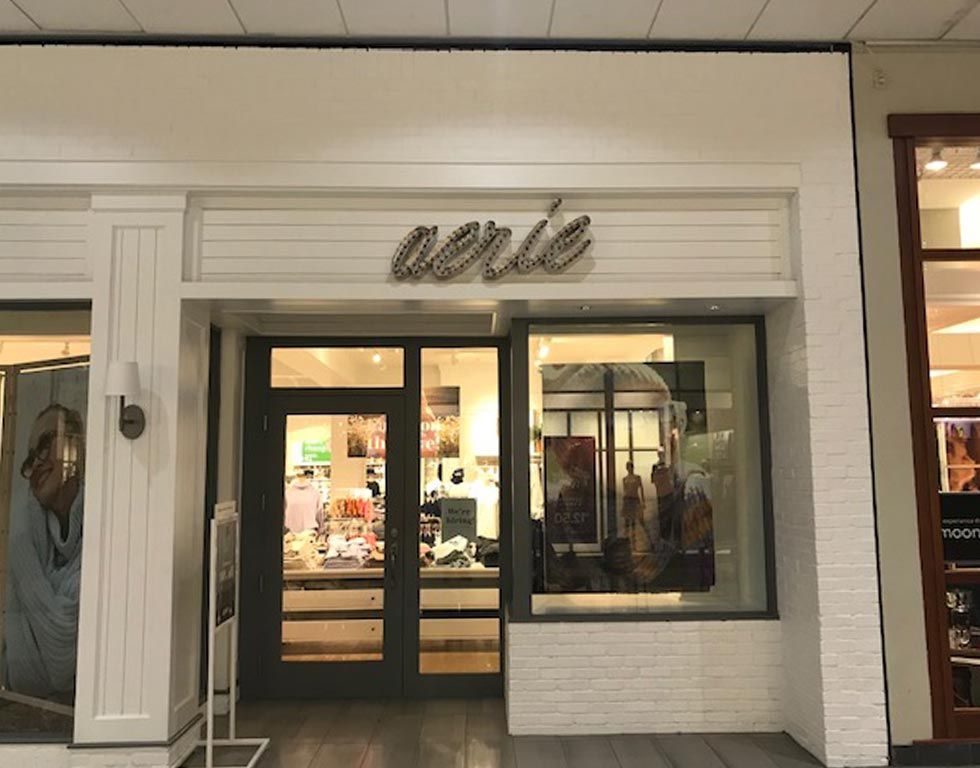 Aerie store front at a mall, with a white exterior and 