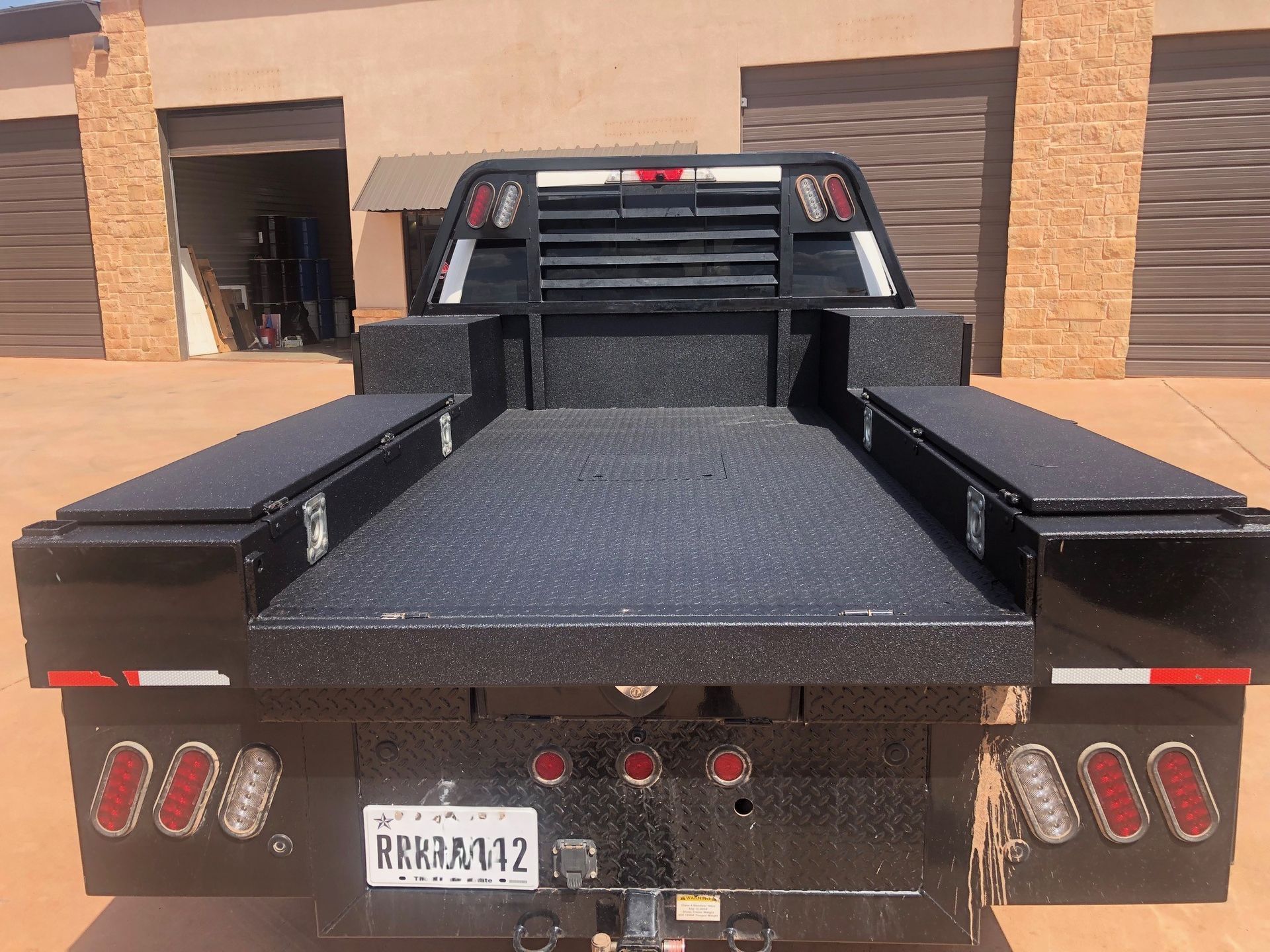 A truck with a license plate that says rrjm412