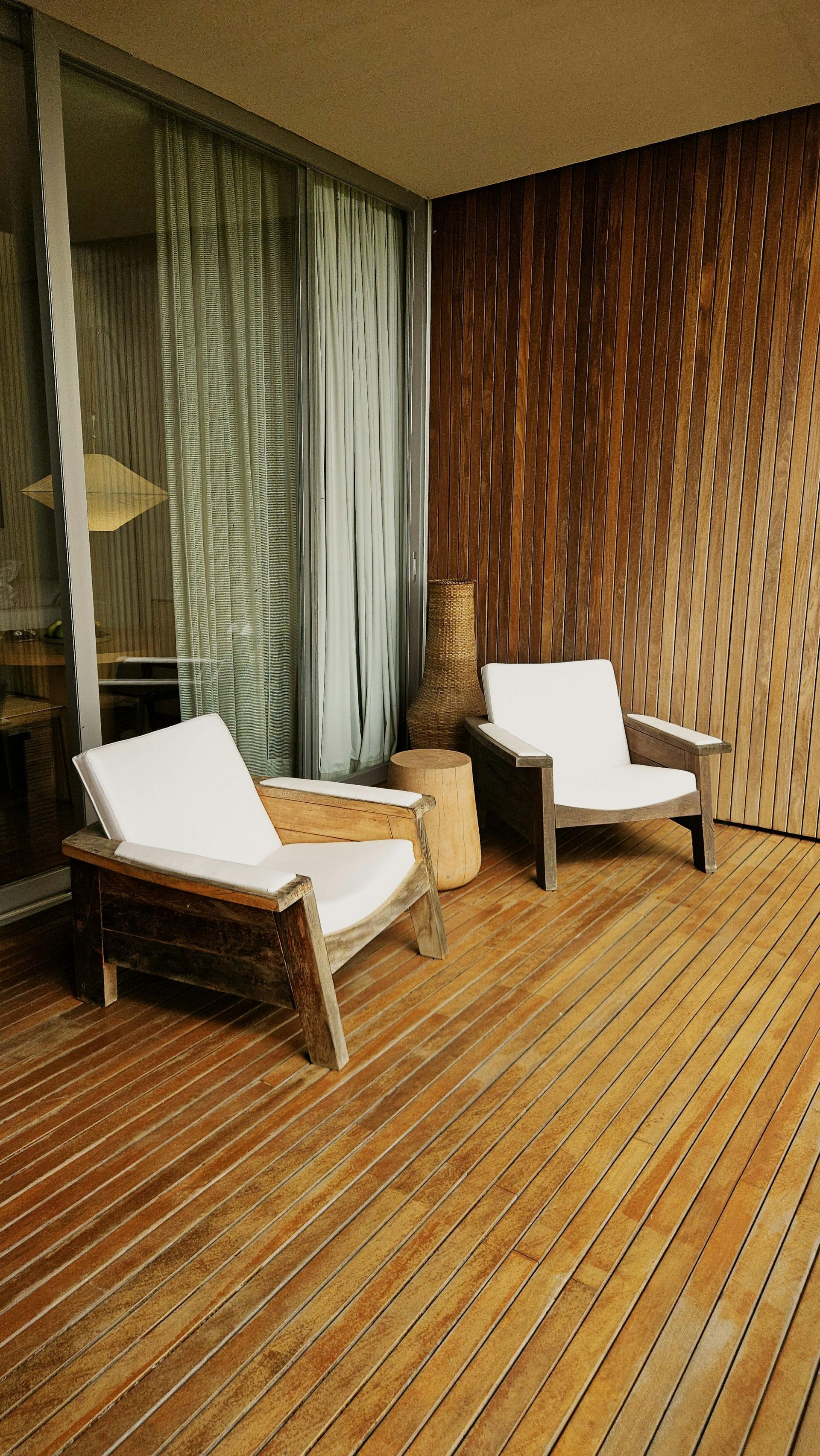 Interior of a flooring store with sample displays, wooden floors, and a decorative ceiling.