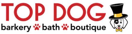Top Dog Barkery Bath Boutique logo with red and black text and a tuxedoed dog icon