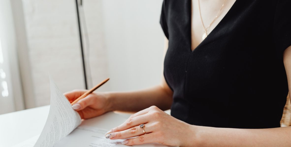 Stethoscope and medical paperwork on top of laptop. Healthcare concept.