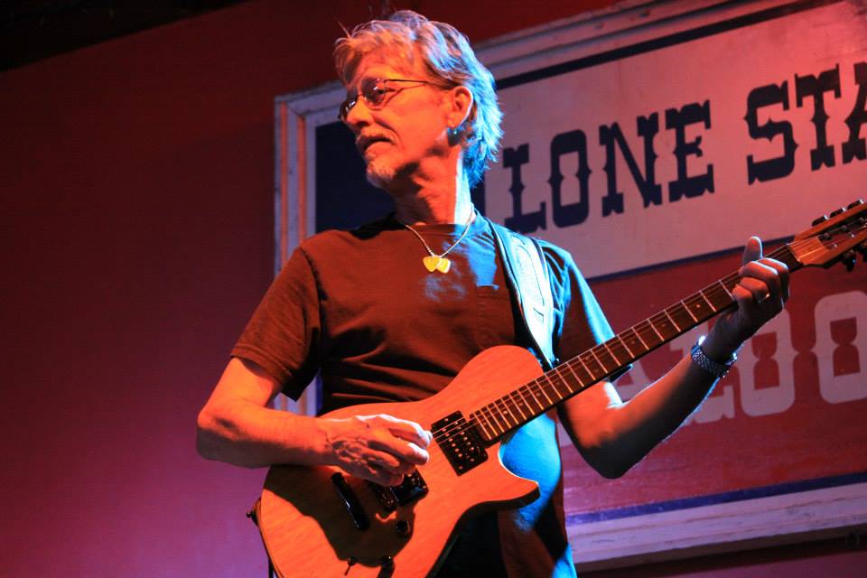 musician playing guitar