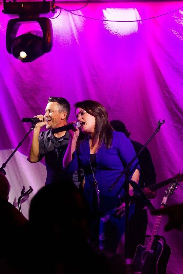 couple performing at the saloon