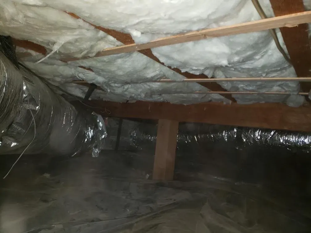 A room with a lot of insulation on the ceiling
