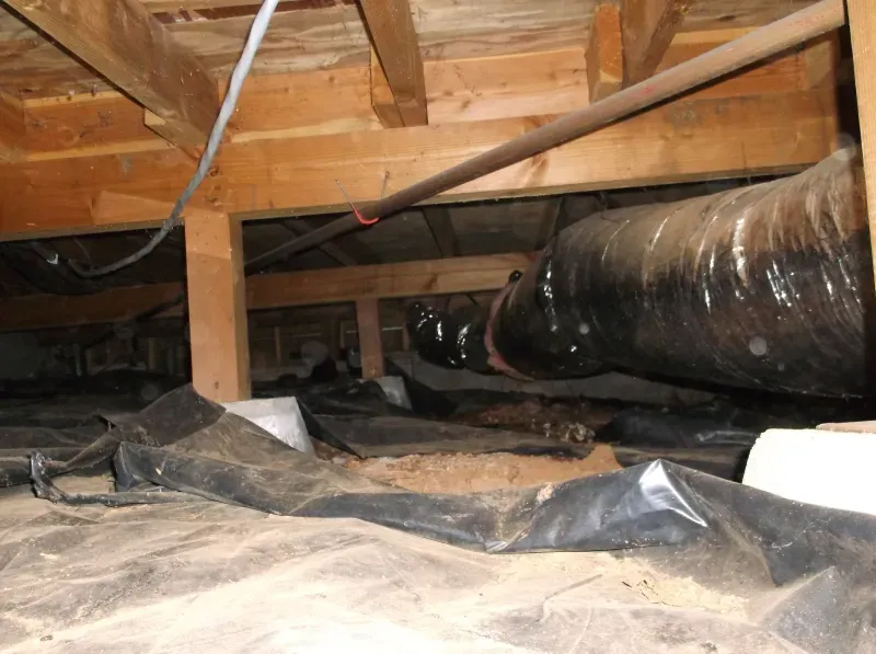 There is a duct in the ceiling of a house.