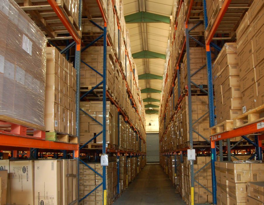 a large warehouse filled with lots of boxes and shelves