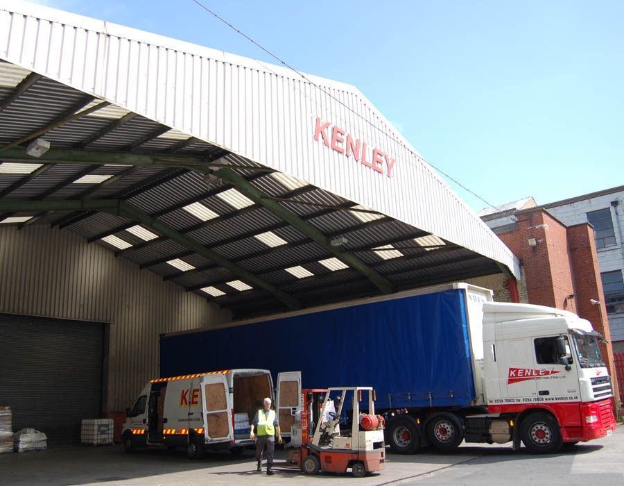 a warehouse with a roof that says kenley on it