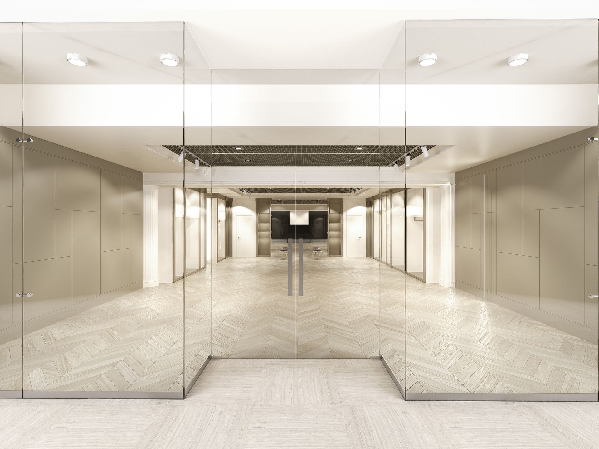 Glass entryway to a modern interior, featuring multiple doors, neutral walls, and a recessed ceiling.