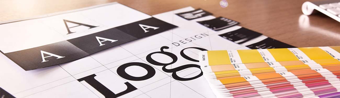 A close up of a logo on a piece of paper on a table.