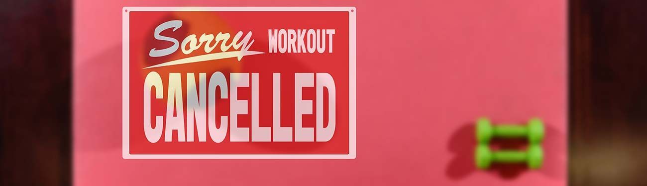 A pink sign that says sorry workout cancelled.