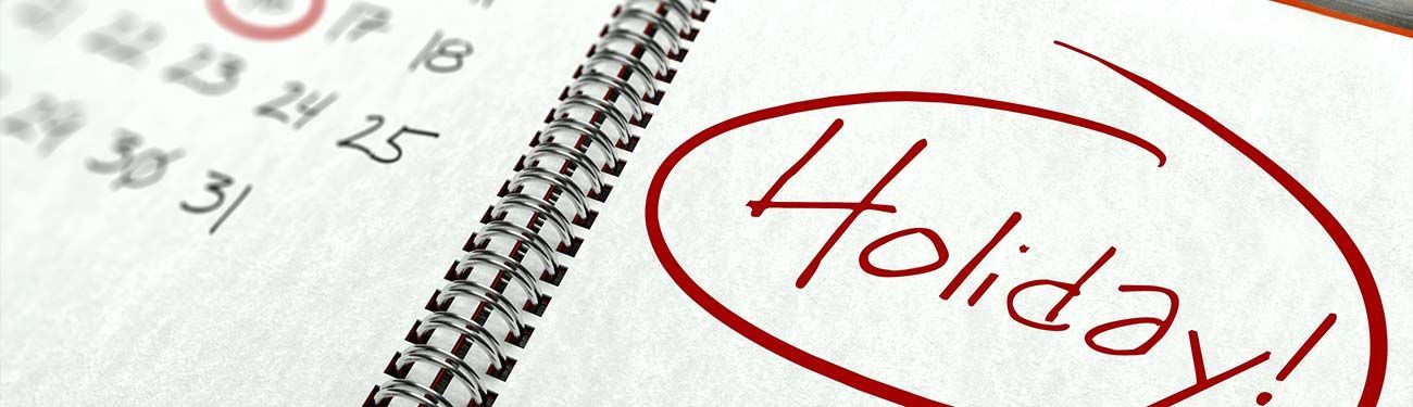 A calendar with the word holiday written on it.