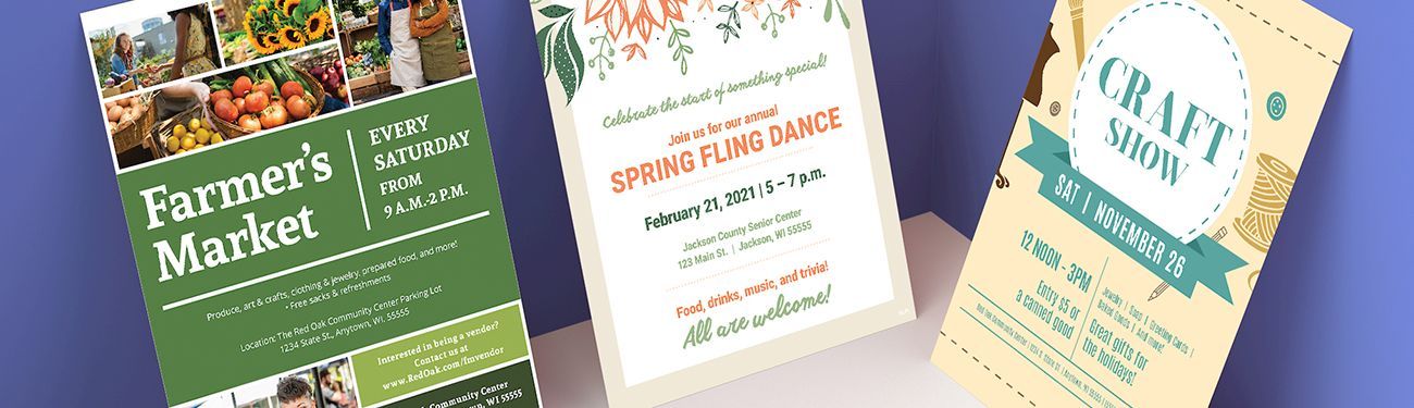 Three brochures are sitting on top of each other on a table.