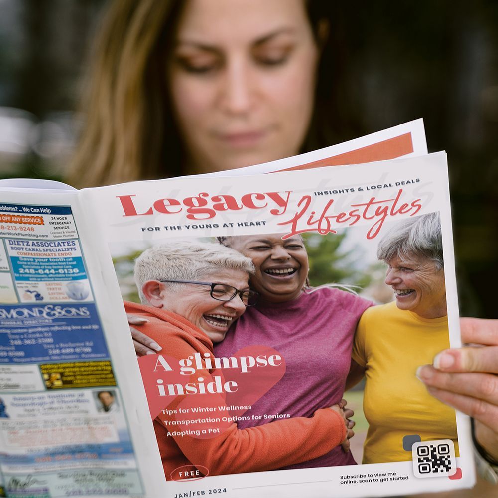 A woman reading a community newsletter.