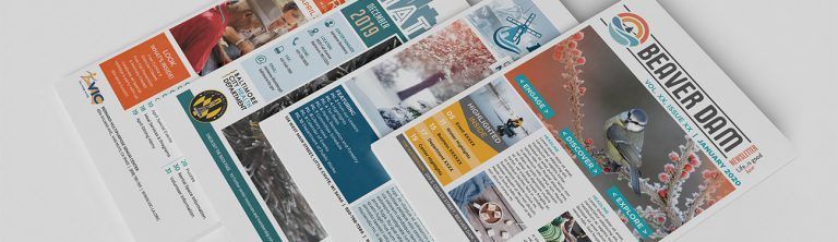 A close up of a newspaper on a table.