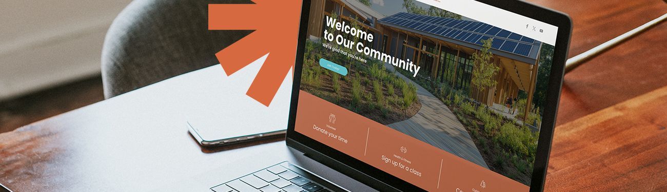 Laptop displaying a community website.