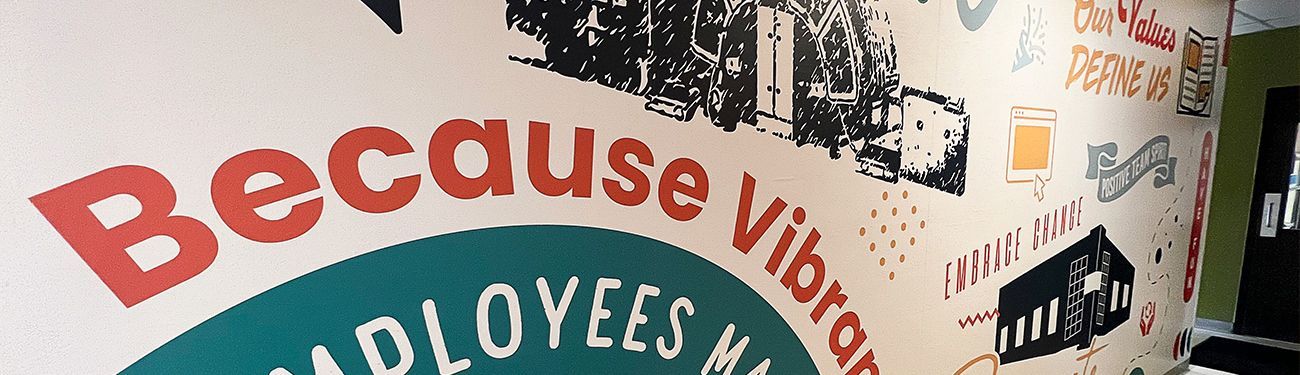 A wall with a mural on it that says `` because employees matter ''.