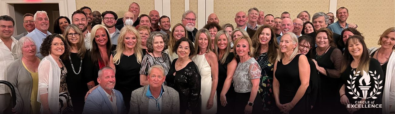 A large group of people are posing for a picture together.