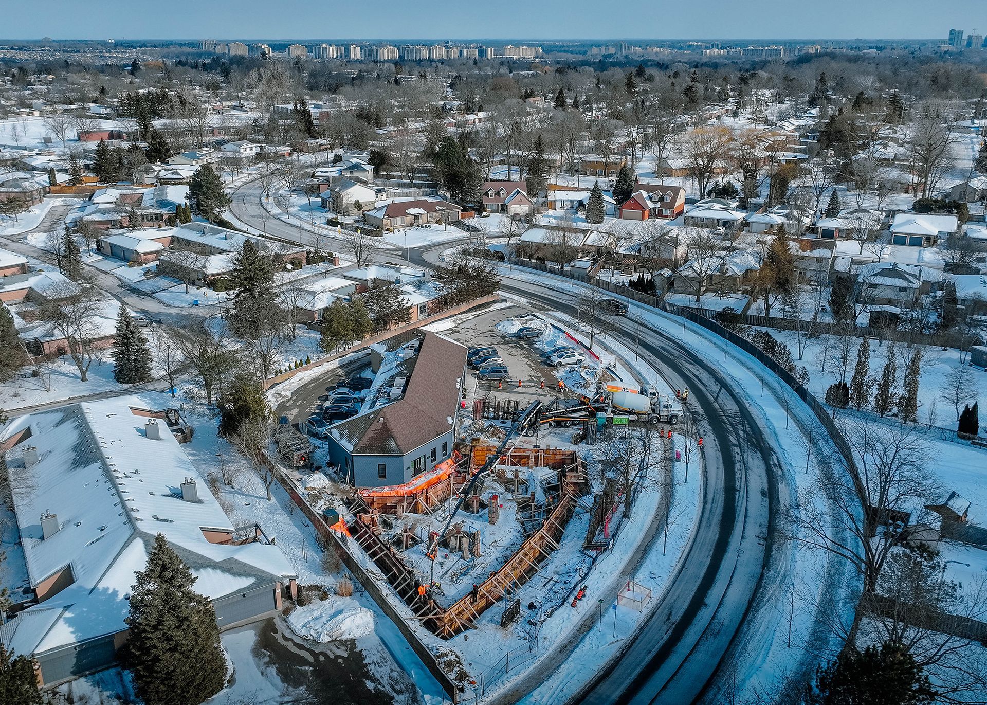 an aerial view of a construction site with a large circle in the middle .