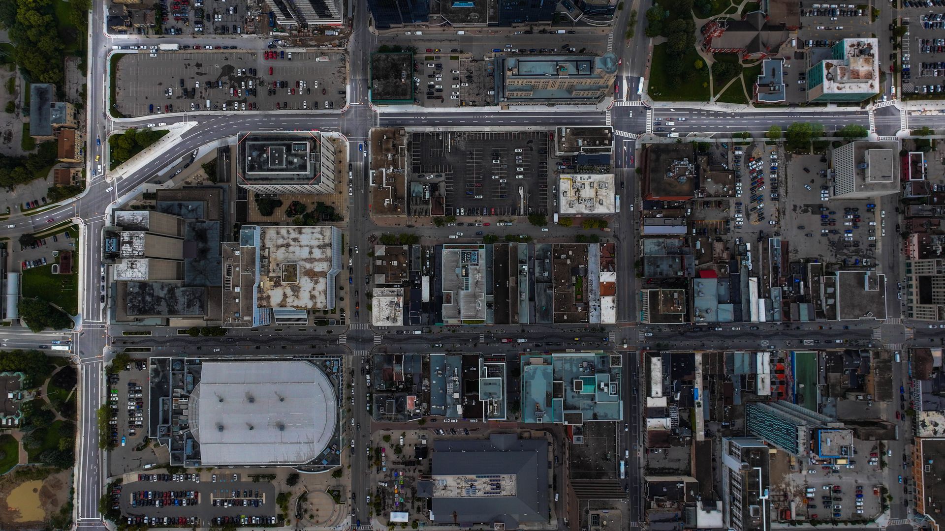 An aerial view of a city with lots of buildings and streets