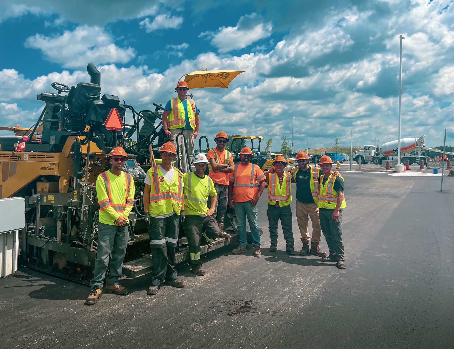 a group of construction workers for paving services