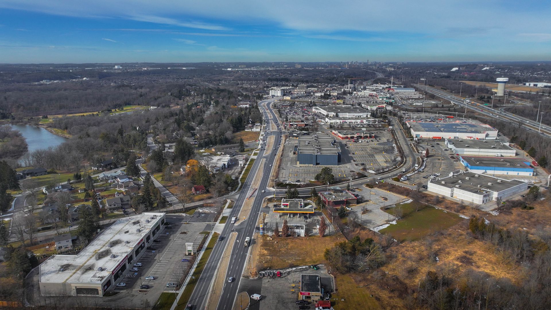 An aerial view of a city with a lot of buildings and roads.