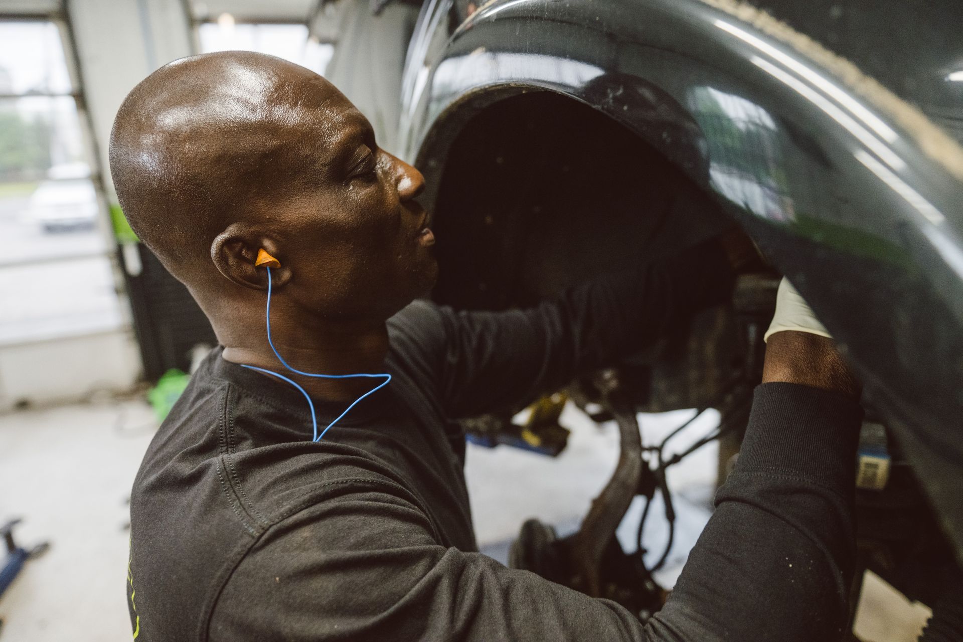 technician working on vehicle