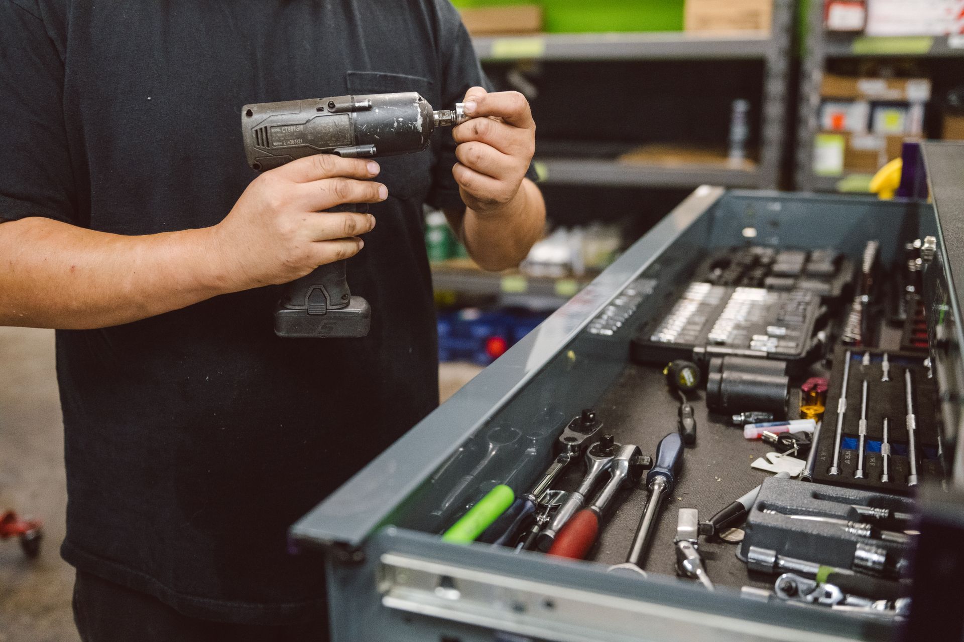 mechanic inspecting tools