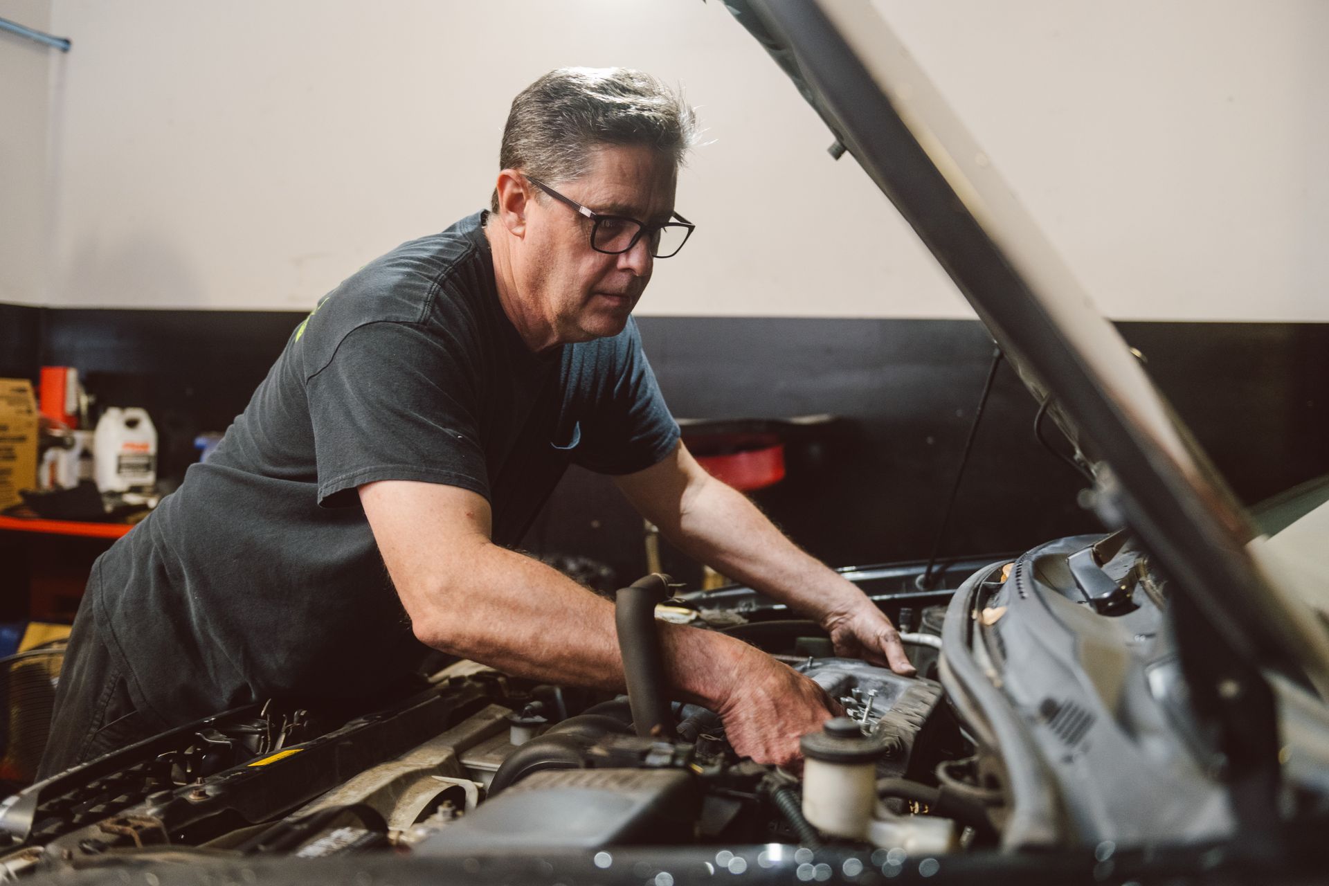 technician inspecting engine