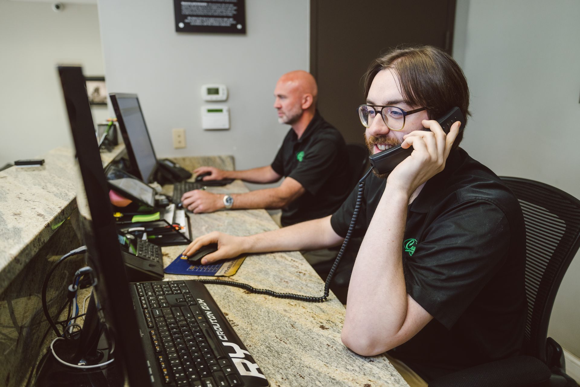 two service advisors working