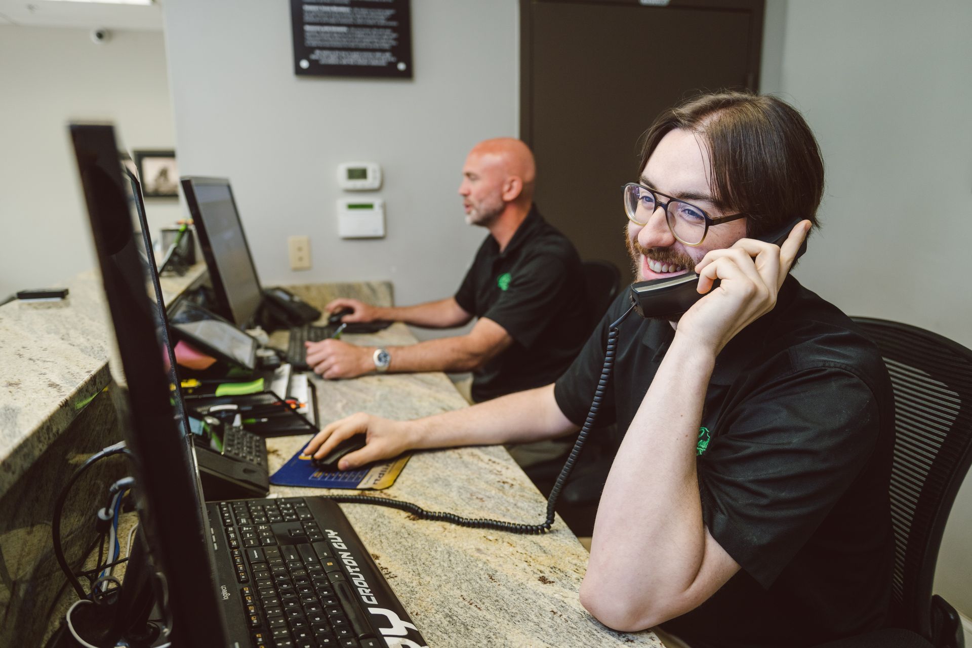 service advisors talking on phone