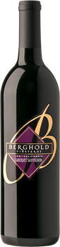 A bottle of black and gold wine with a purple label