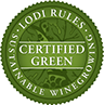 A green seal that says `` certified green '' on it.