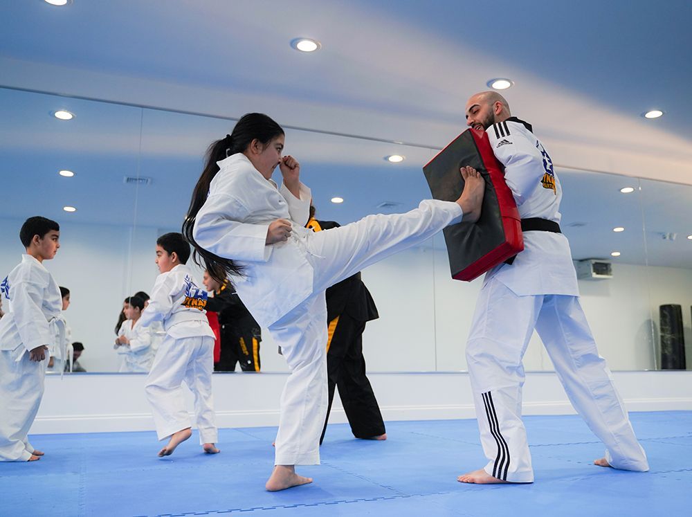 A blurry picture of a bunch of colorful lights on a dark background.