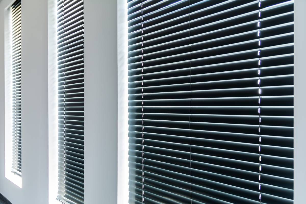 Three sets of modern horizontal blinds in a home near Boerne, Texas (TX)