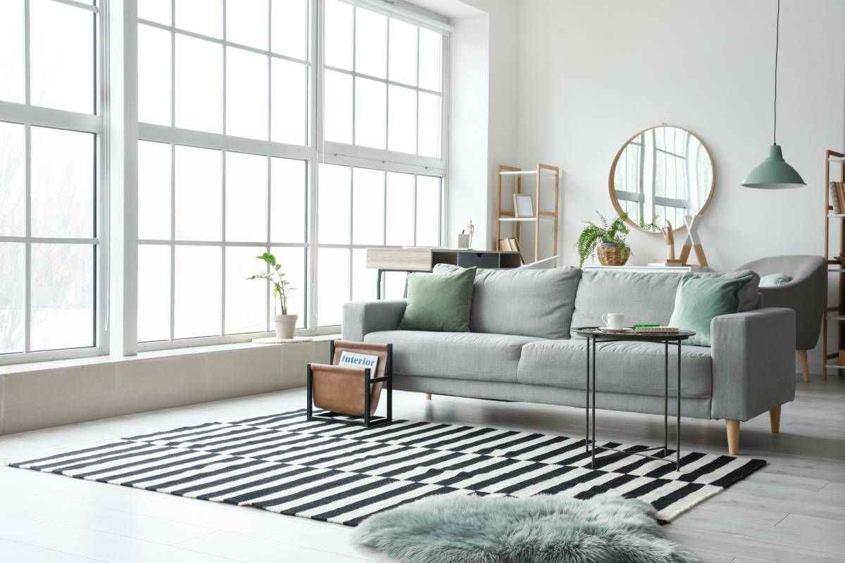 A modern living room with a large array of windows at Blinded by Delight Window Coverings & Design near San Antonio and Boerne, Texas (TX)