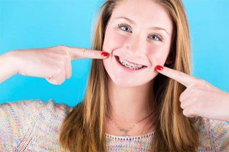 Woman with Braces Smiling — Dental Braces in South Lawrence, MA