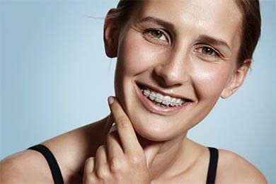 Adult Woman Wearing Braces — Orthodontics in Reading, MA