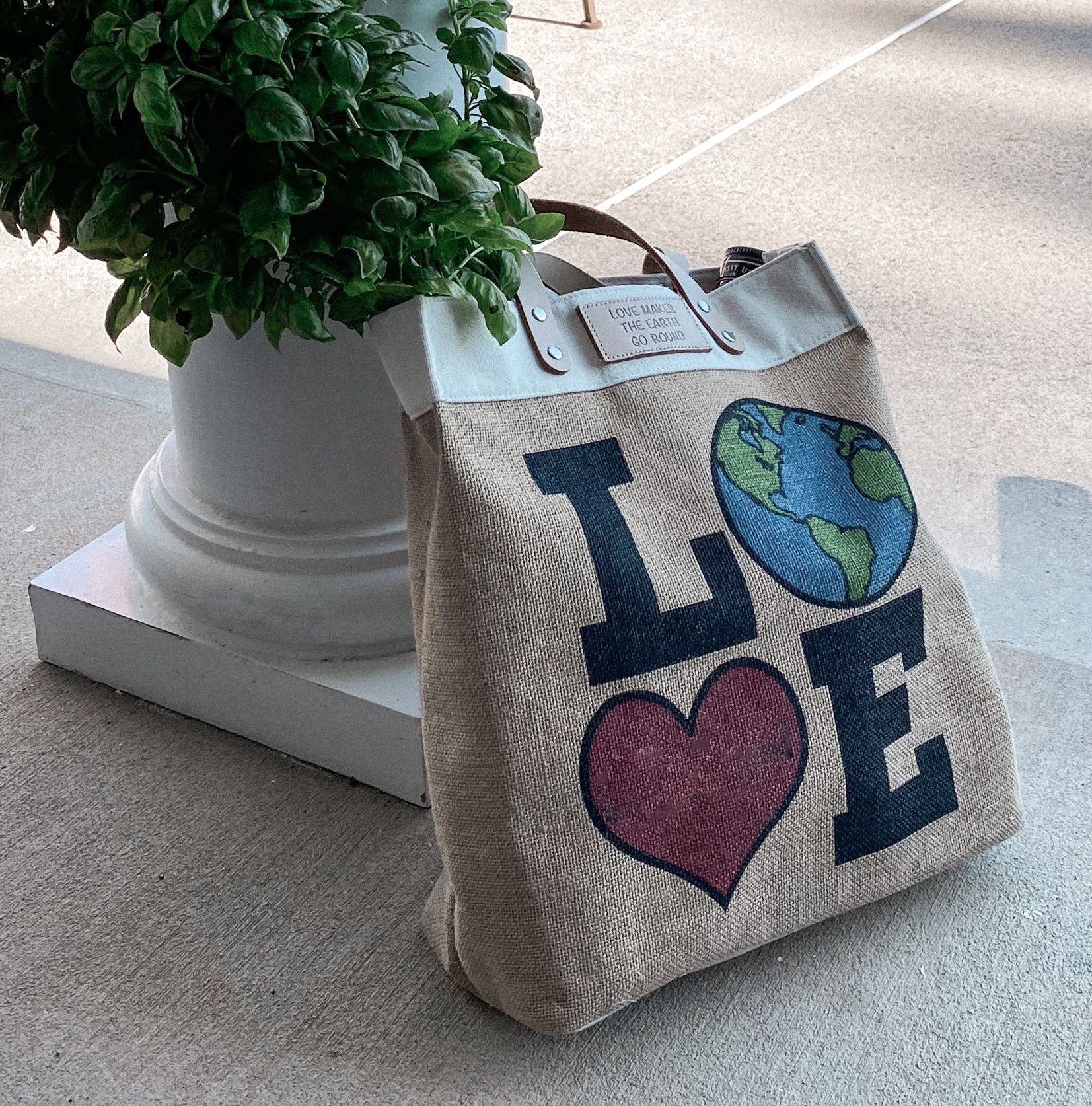 A tote bag with the word love on it