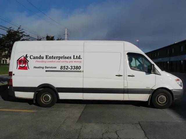 A white van that says canda enterprises ltd. on it