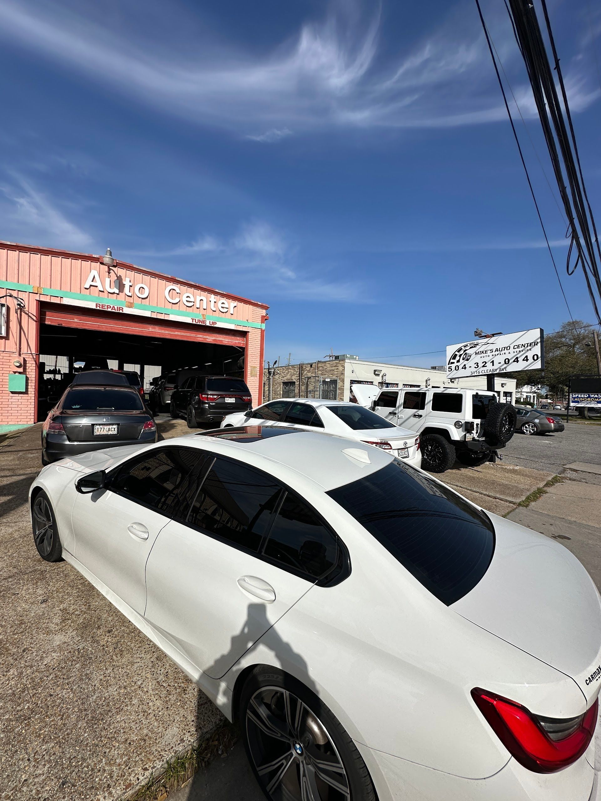 White Car Parked Outside | Mike's Auto Center