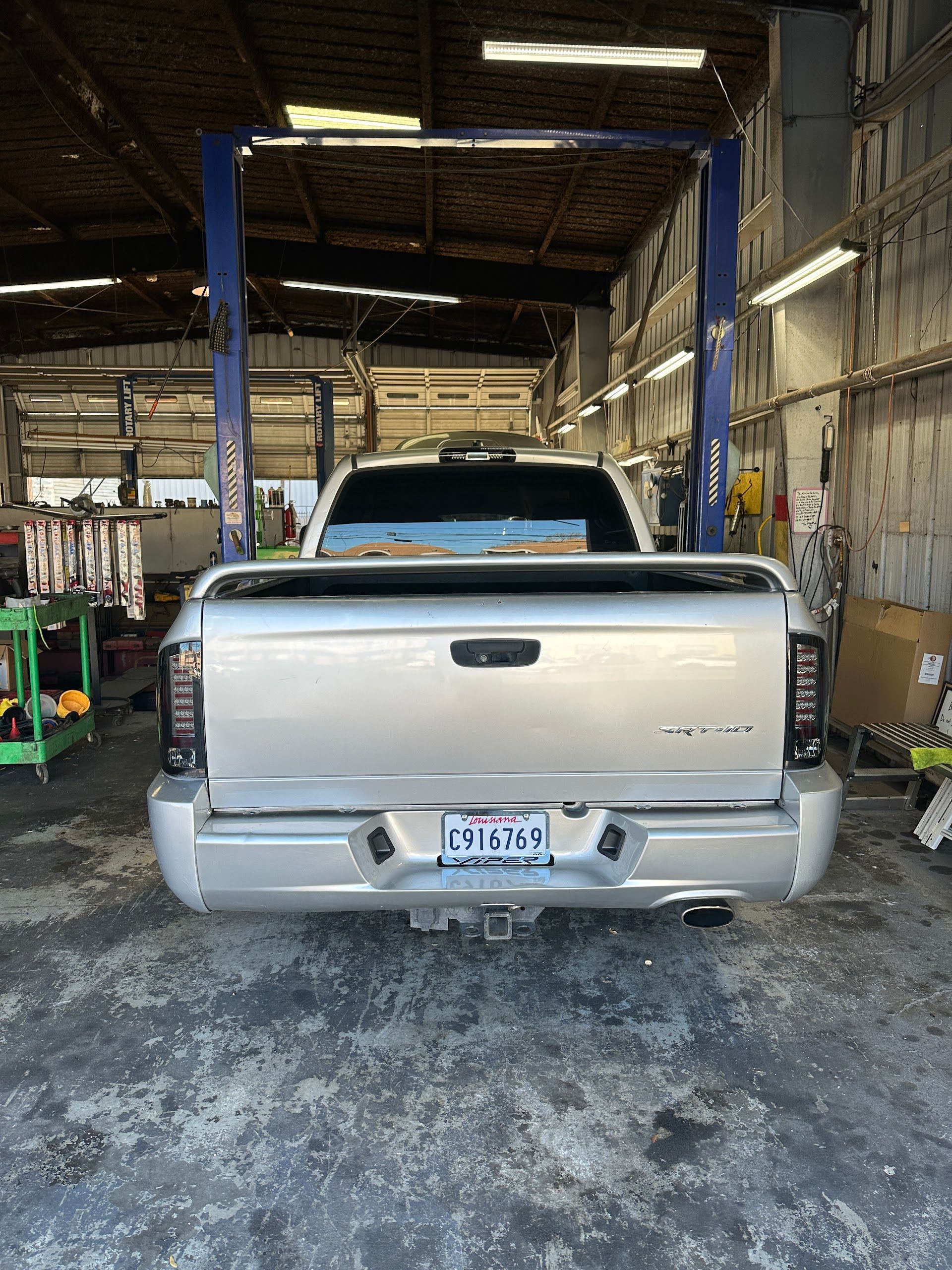 Silver Pickup Truck in a Garage Bay | Mike's Auto Center